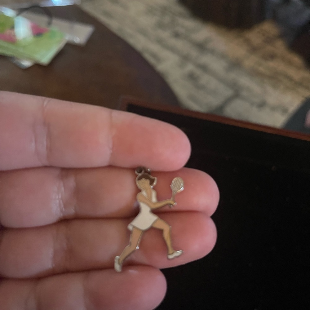 Tennis charm